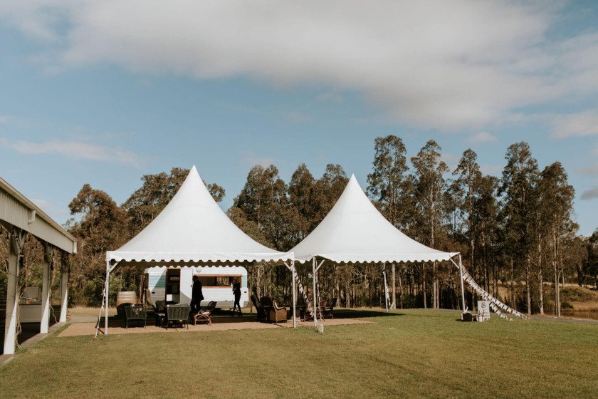 The pagoda marquees and pavilion on the Croquet Lawn with the cypress row